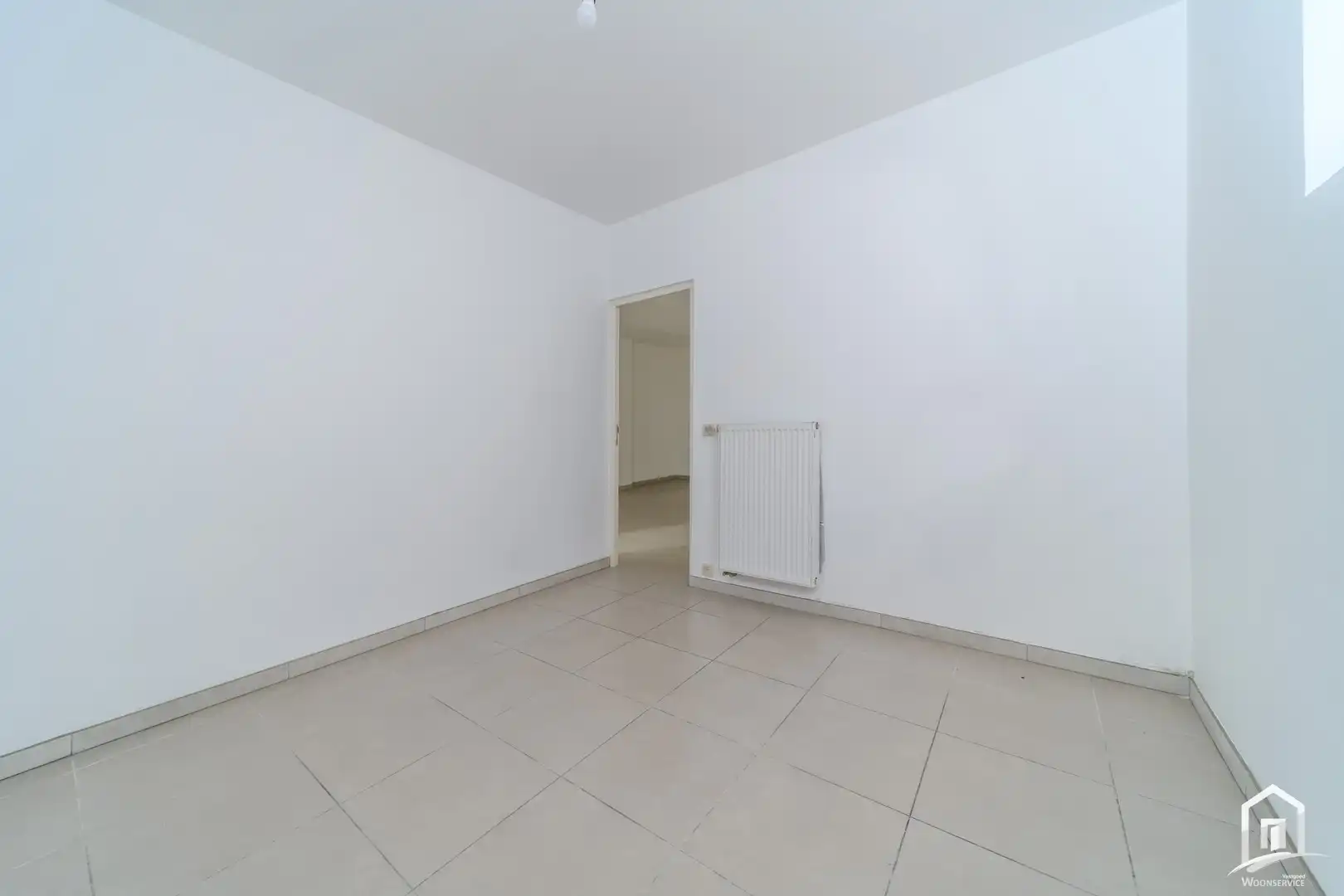 Ruim en energiezuinig gelijkvloersappartement met terras en autostaanplaats foto 15