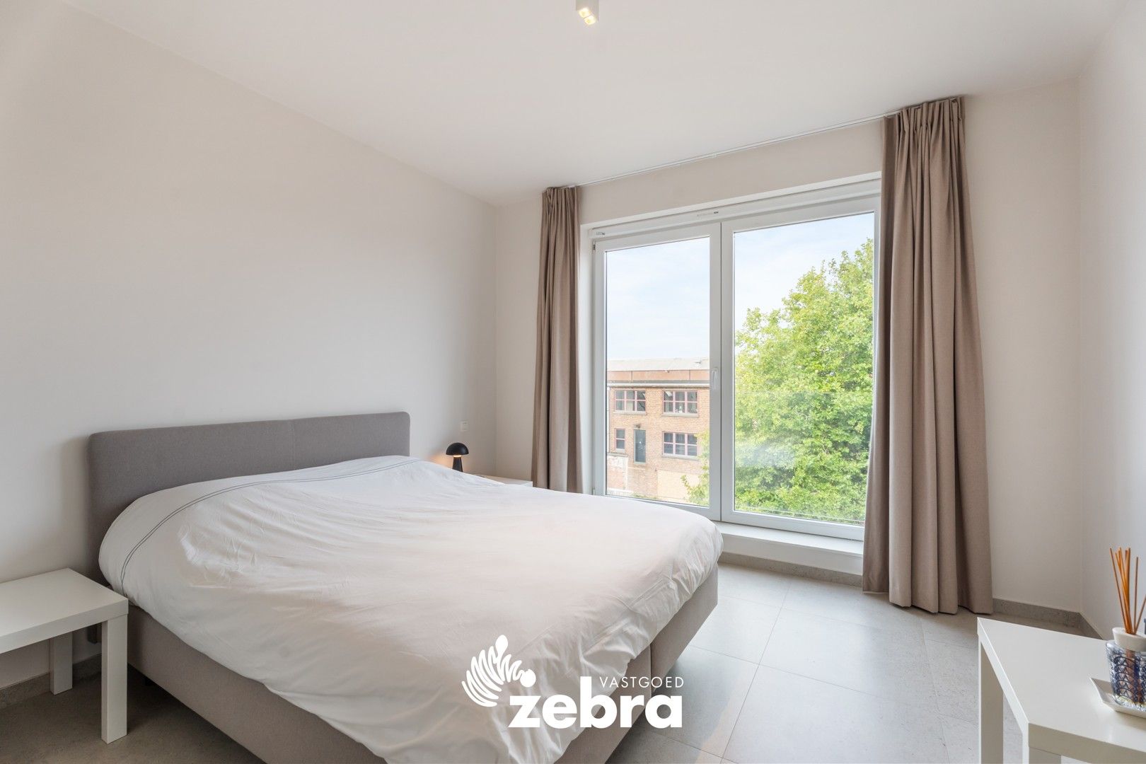Recent tweeslaapkamerappartement met autostaanplaats vlak bij centrum Roeselare! foto 9