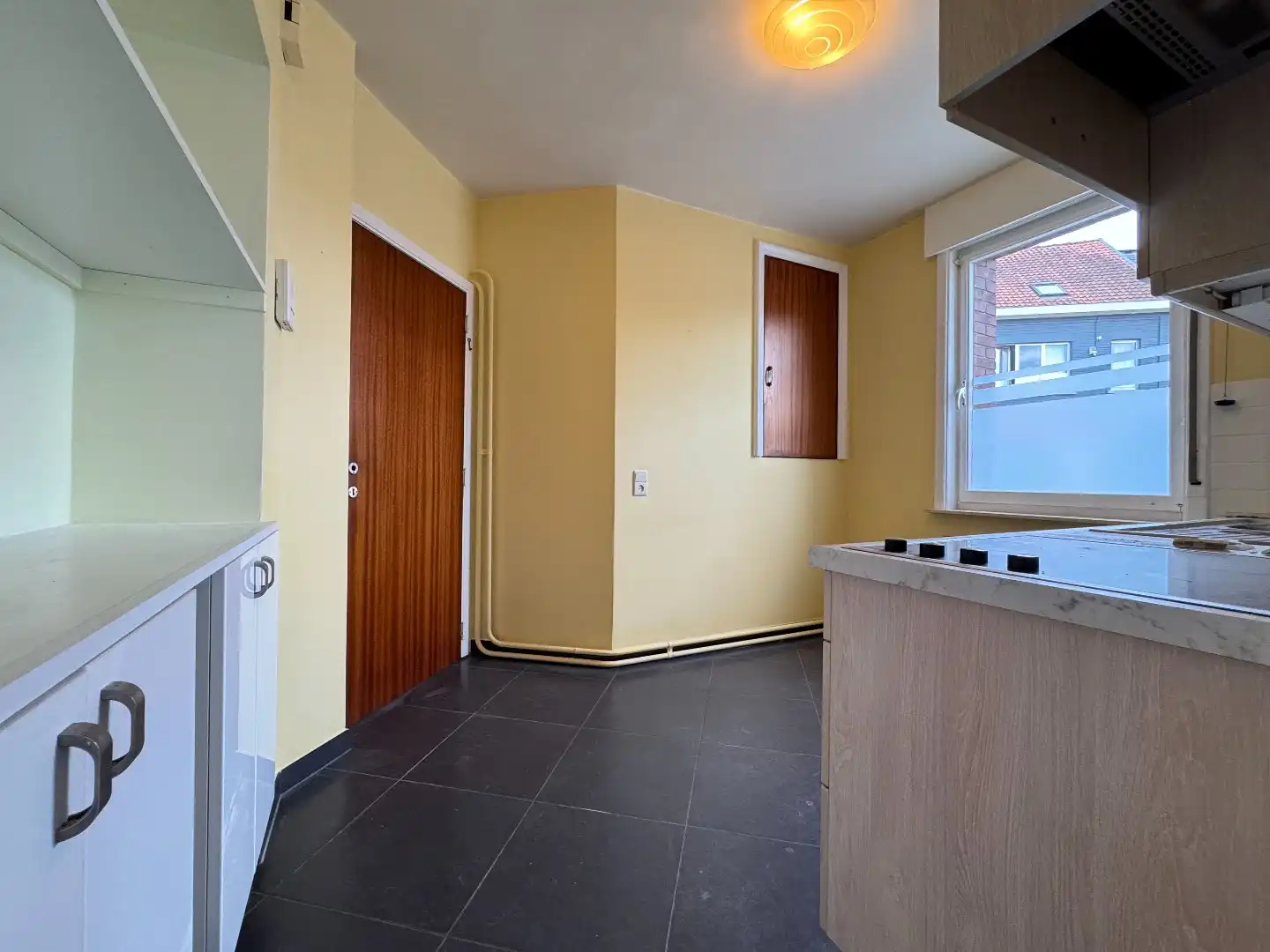 Ruim hoekappartement met garage foto 5