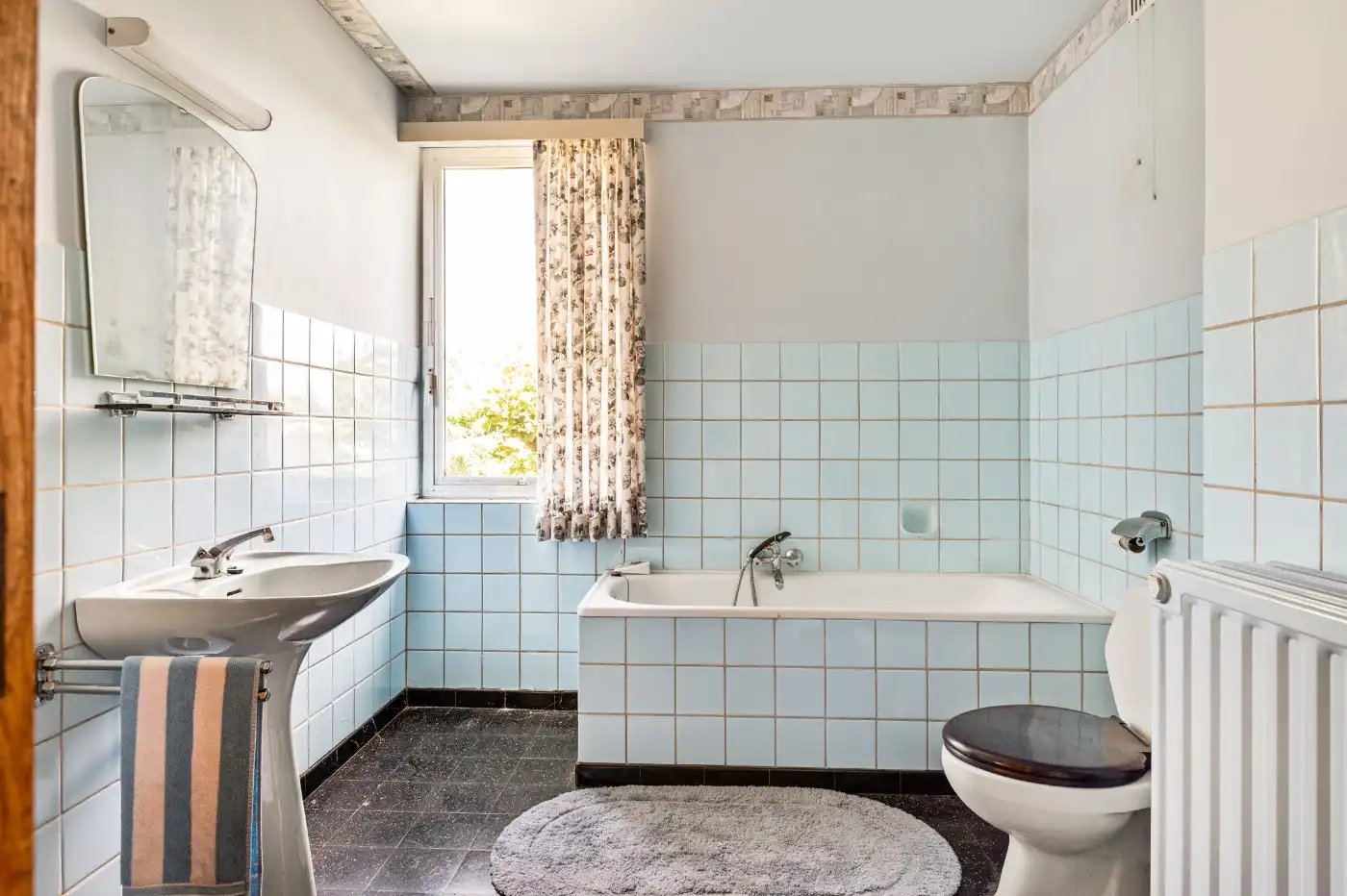 Te renoveren woning met 3 à 4 slpk., garage en tuintje foto 8