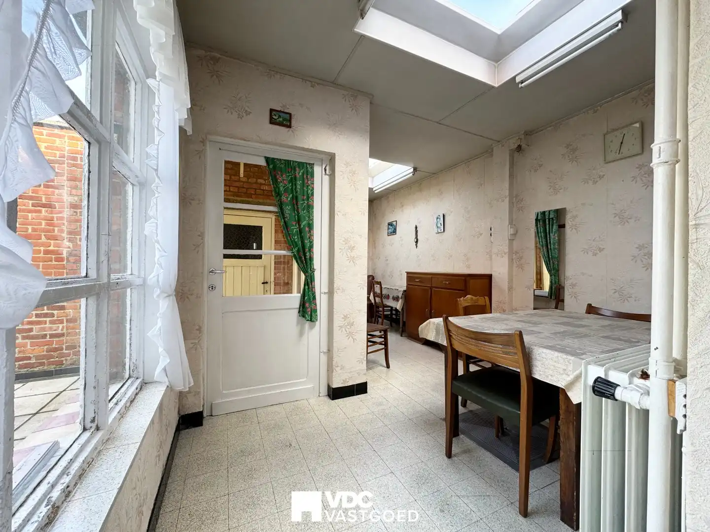 Charmante te renoveren woning met tuin, garage en sterk investeringspotentieel foto 7