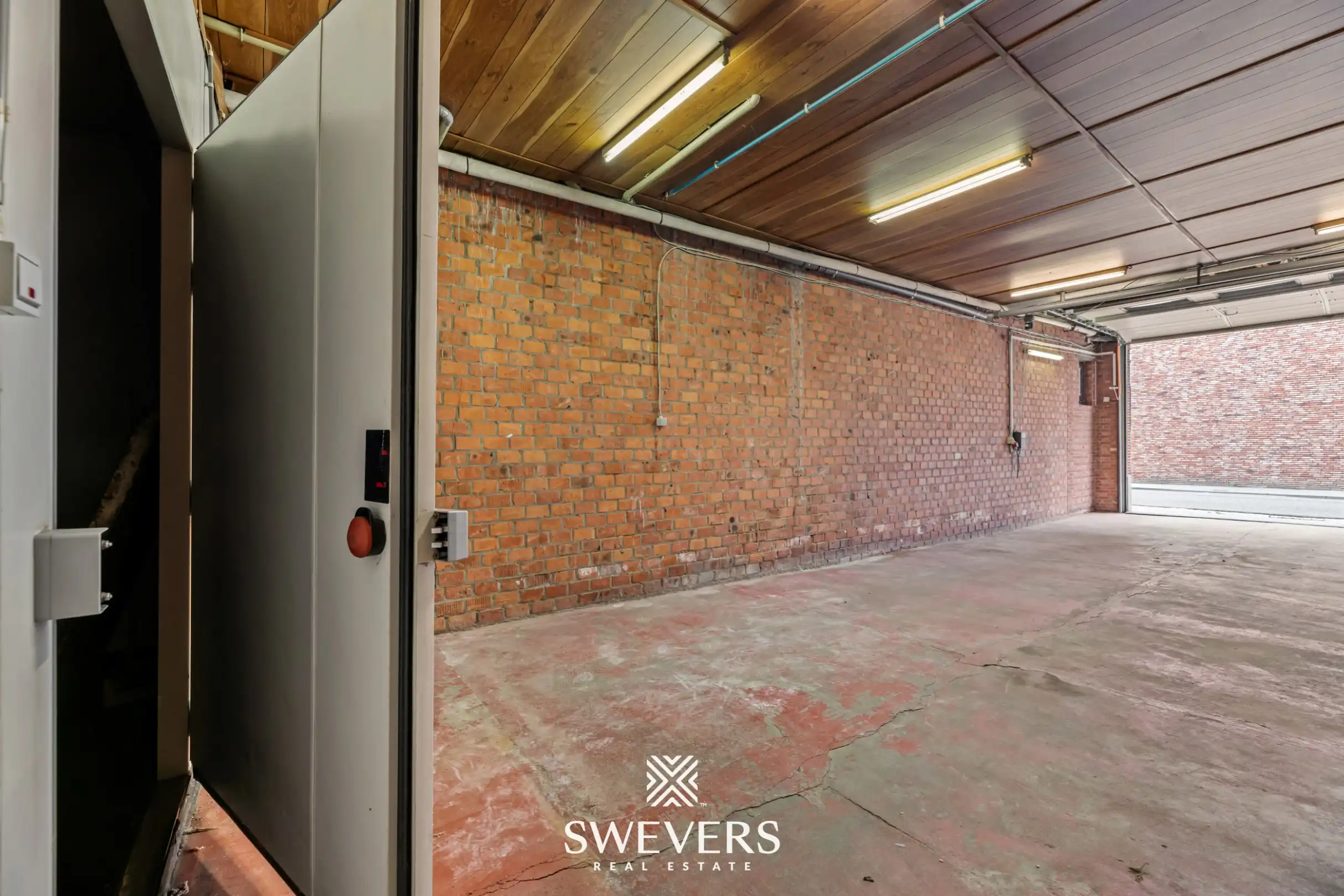 223 m² woonruimte met uitzonderlijke garage van ca. 100 m² nabij centrum foto 15
