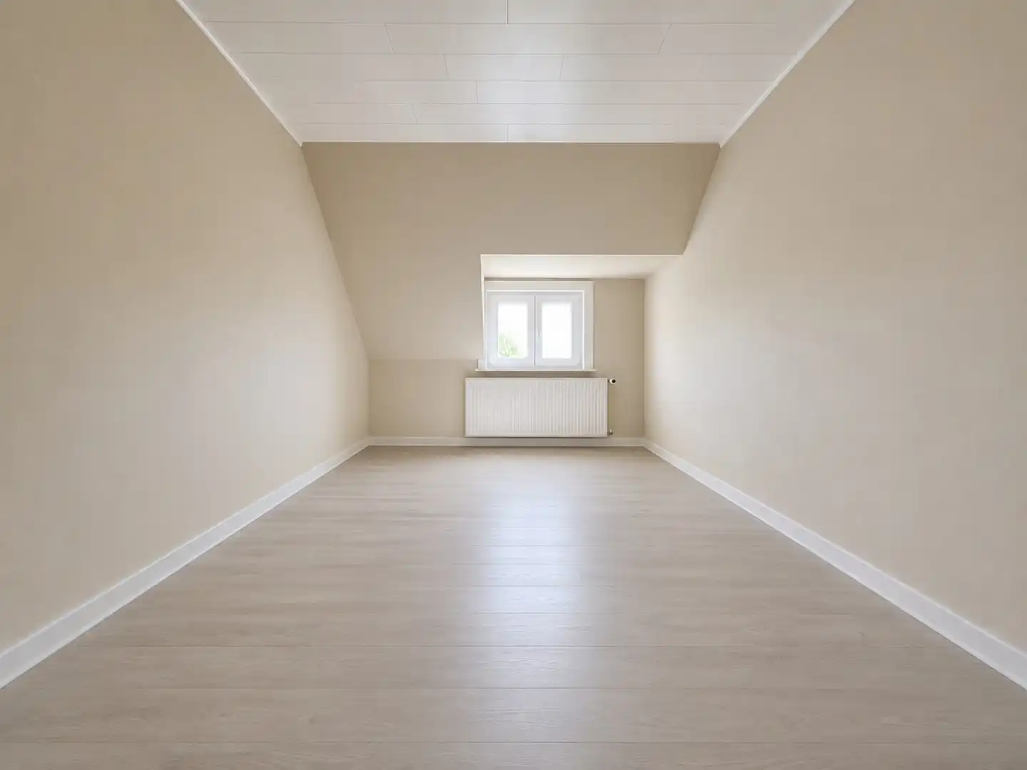 Centraal gelegen rijwoning met 4 slaapkamers en tuin.  foto 9