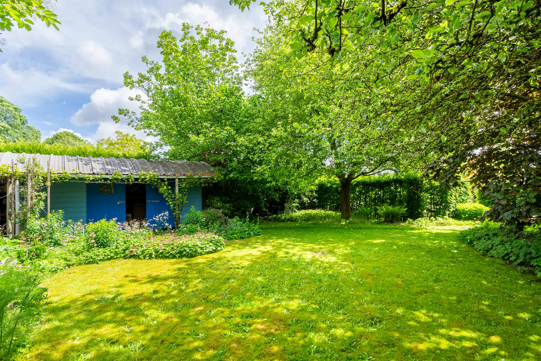 Ruime gezinswoning met zonnige tuin op toplocatie! foto 14