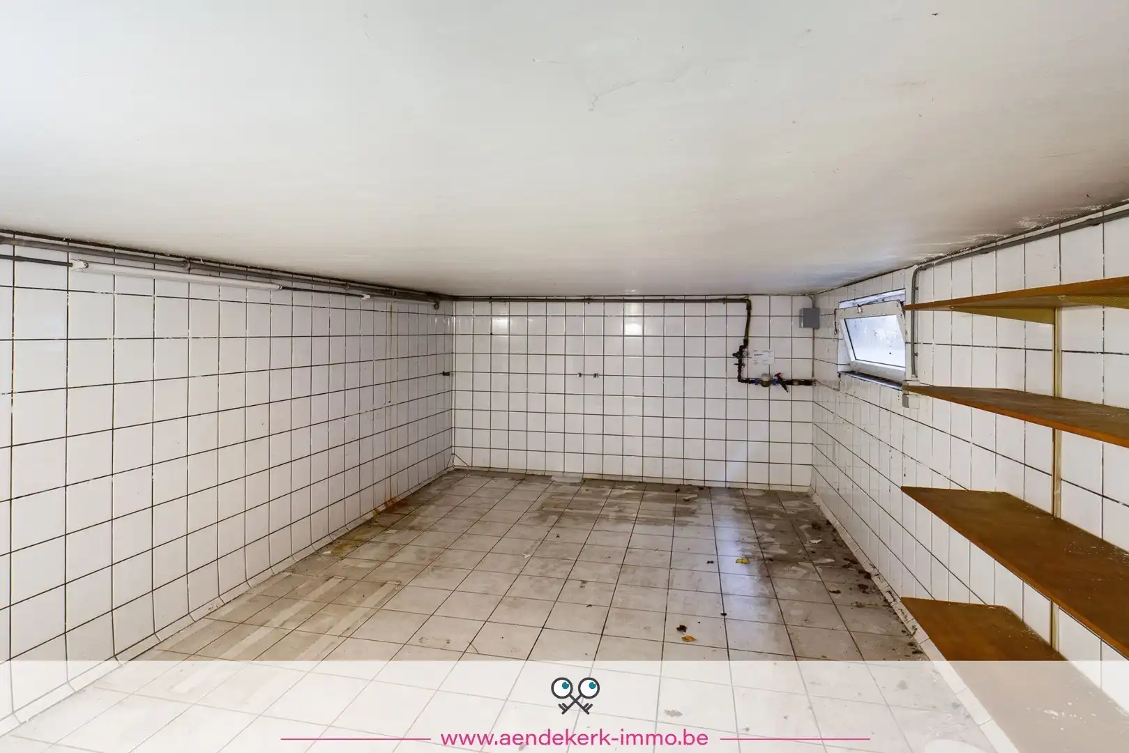 Woning met handelsruimte in het centrum van Kinrooi foto 26