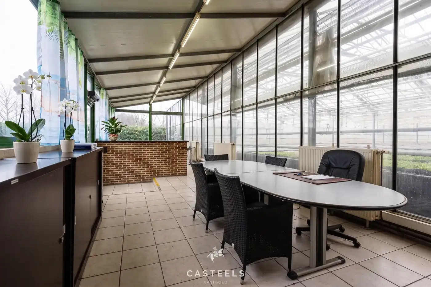 Professionele tuinbouwsite van 1,98 ha met 9.400 m² serres nabij E17 / R4 foto 2