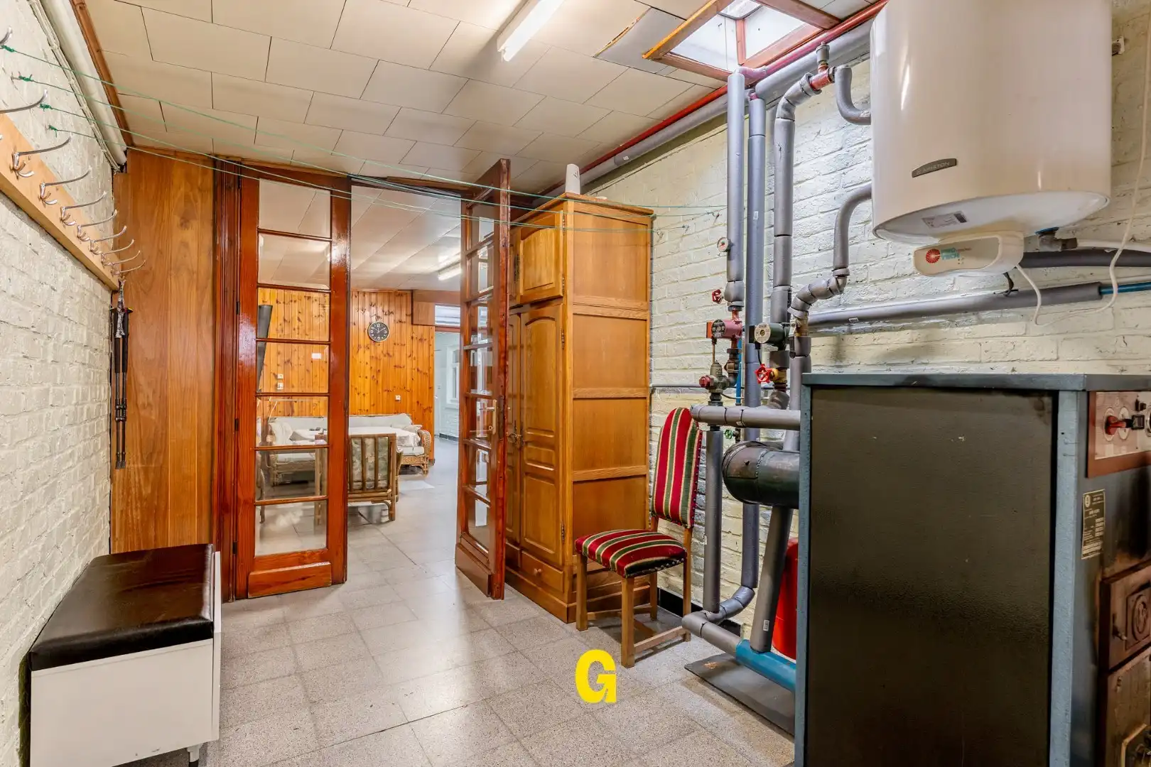 Te renoveren woning met 3 slaapkamers, inpandige garage en tuin foto 13