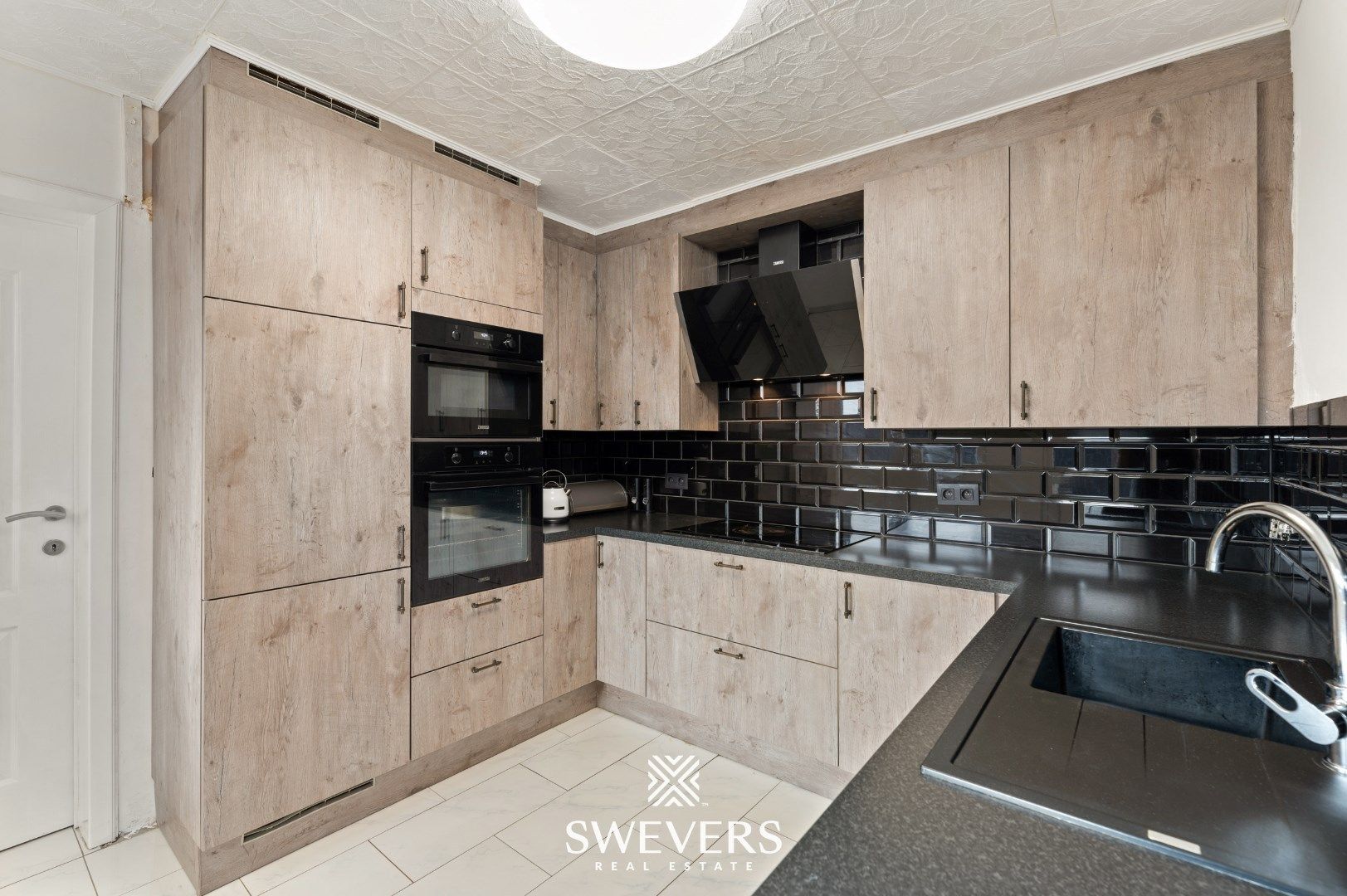 Charmante woning met Handelspand te Leopoldsburg foto 9