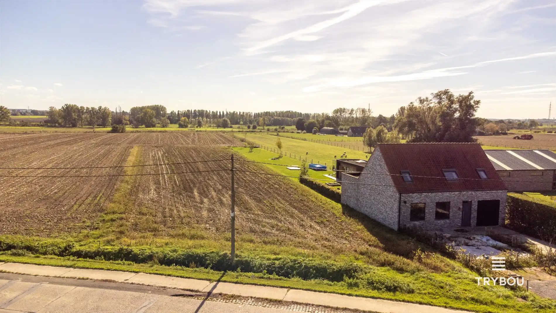 Ruime bouwgrond van 2.920 m² voor halfopen bebouwing in Poelkapelle foto {{pictureIndex}}