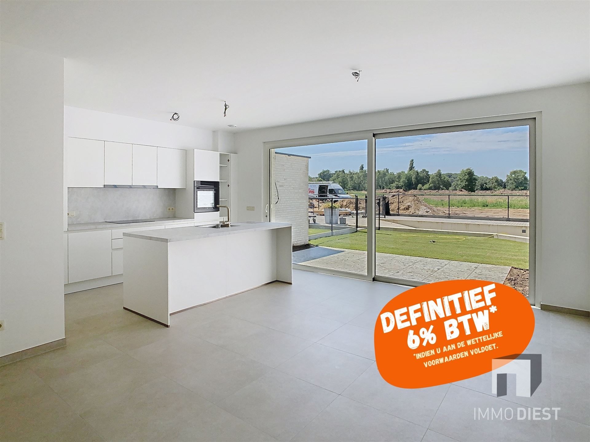 Gelijkvloers appartement met terras en tuintje foto {{pictureIndex}}