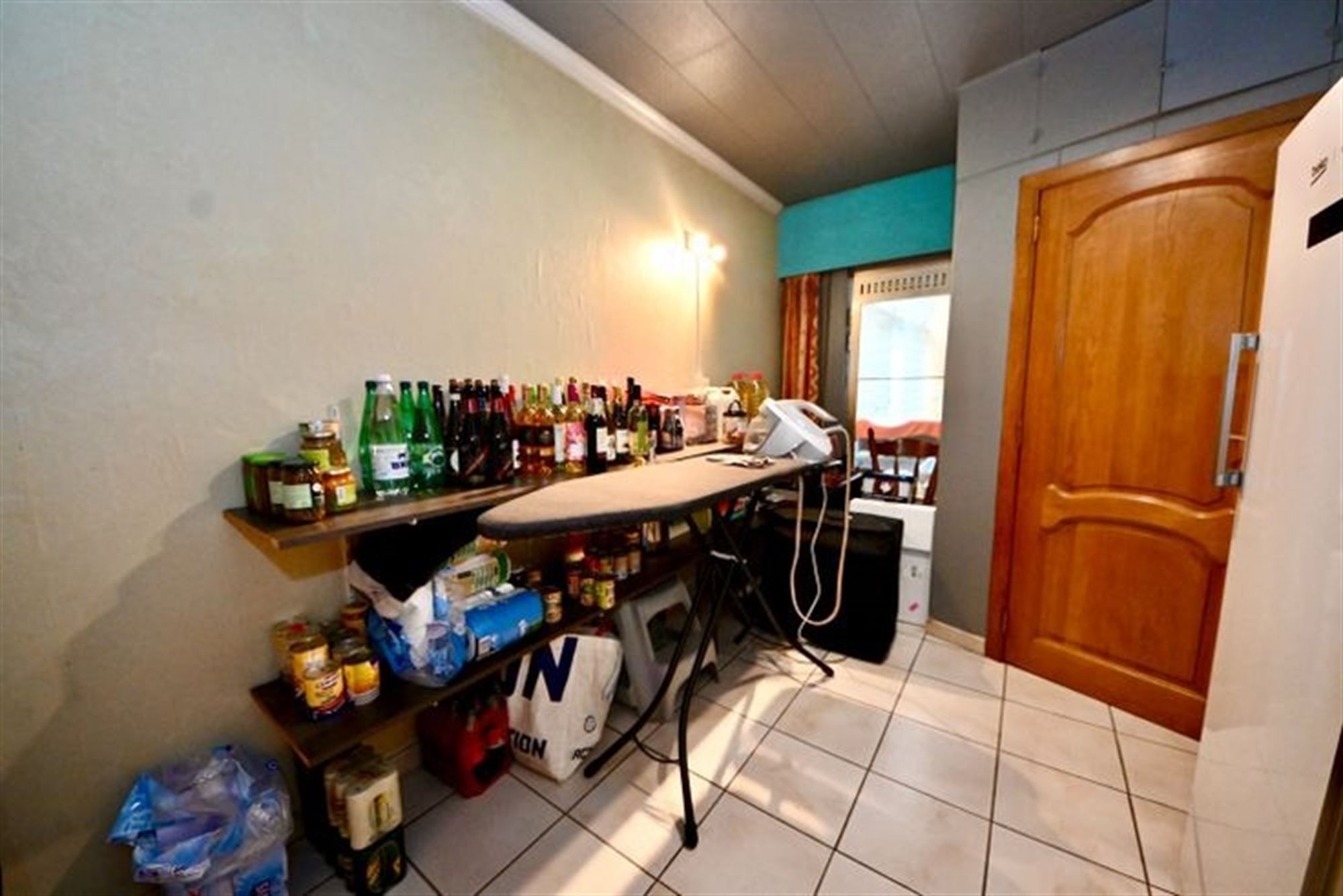 Te renoveren laagbouw met 3 slaapkamers, tuin en garage.  foto 14