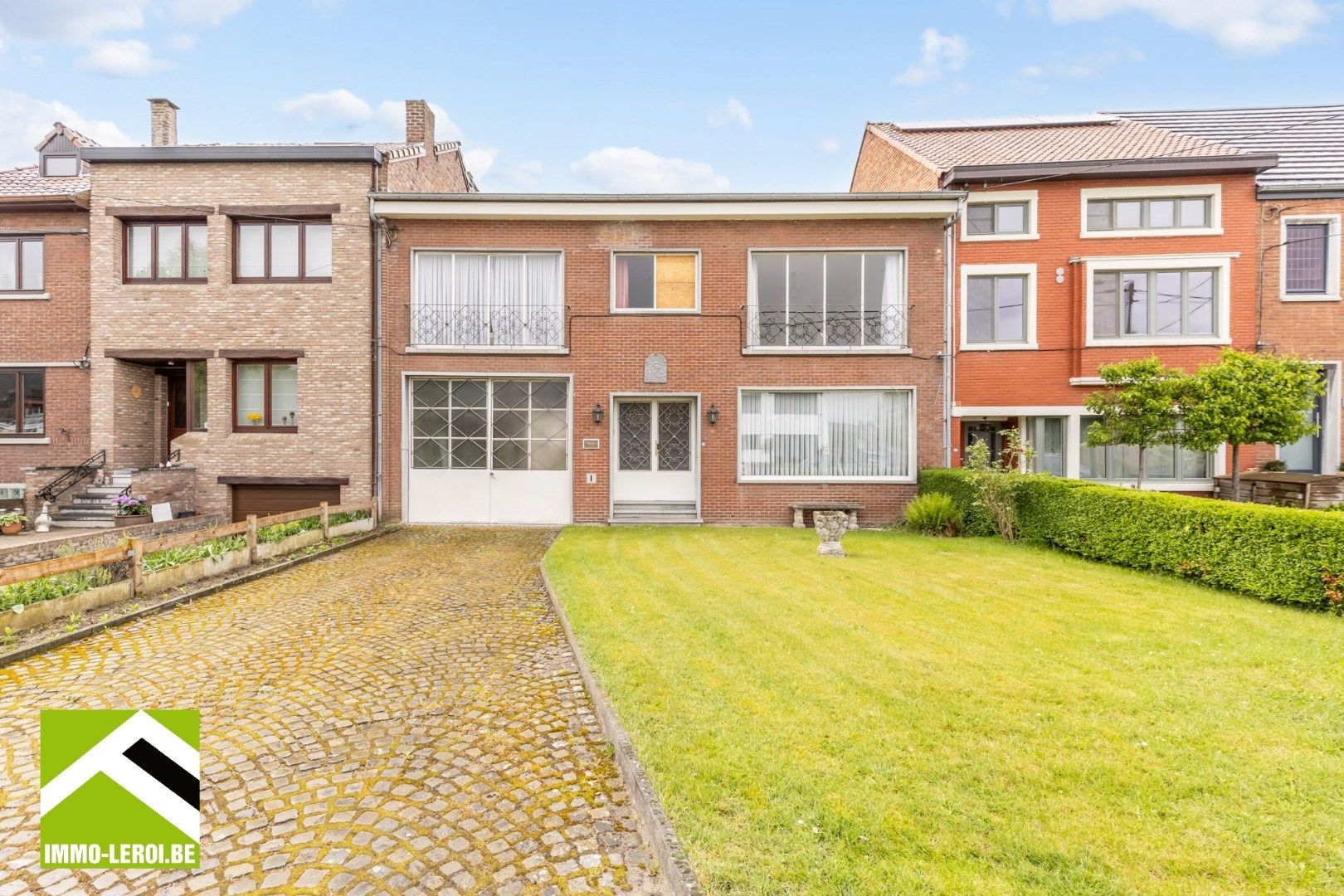 Hoofdfoto van de publicatie: Ruime woning met 4 slaapkamers en grote garage +/- 135 m²