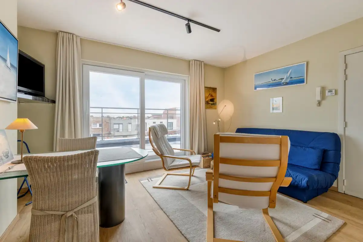 Appartement met 1 slaapkamer en twee ruime zonneterrassen, met een parkeerplaats in het gebouw die samen met het appartement aangekocht dient te worden. foto 10