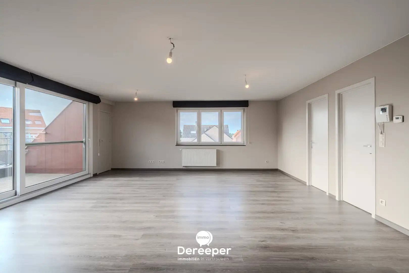 Modern en ruim duplexappartement met 3 slaapkamers in het centrum van Zerkegem foto 4