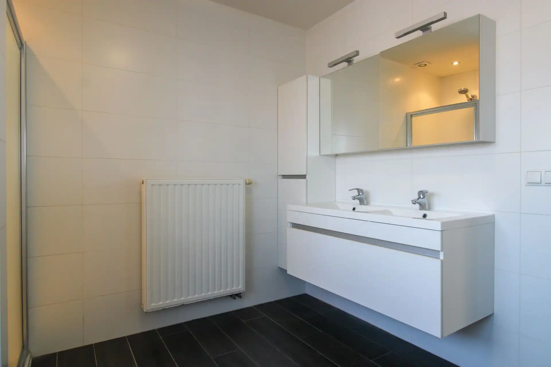 Instapklare gezinswoning met 3 slaapkamers, carport en onderhoudsvriendelijke tuin in het hart van Uikhoven! foto 14