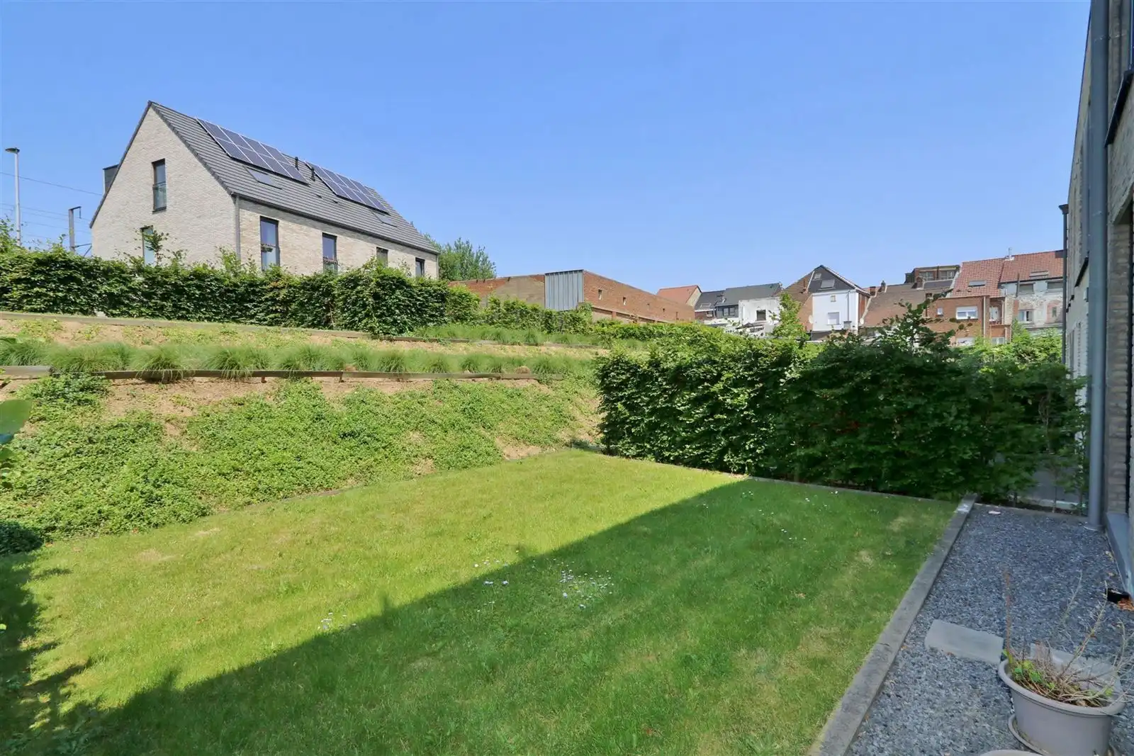 Gelijkvloersappartement met 2 slaapkamers, tuin en staanplaats foto 11