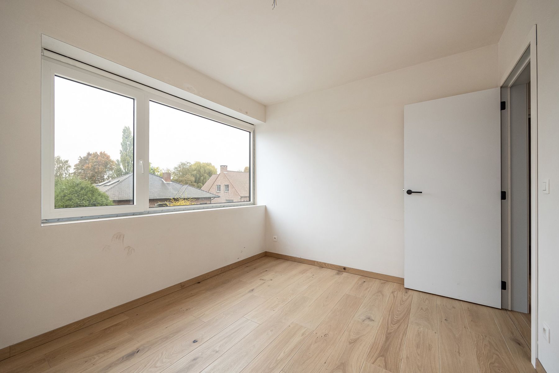 Halfopen woning met 3 slaapkamers en carport/fietsenberging op perceel van ca 320m² foto 14