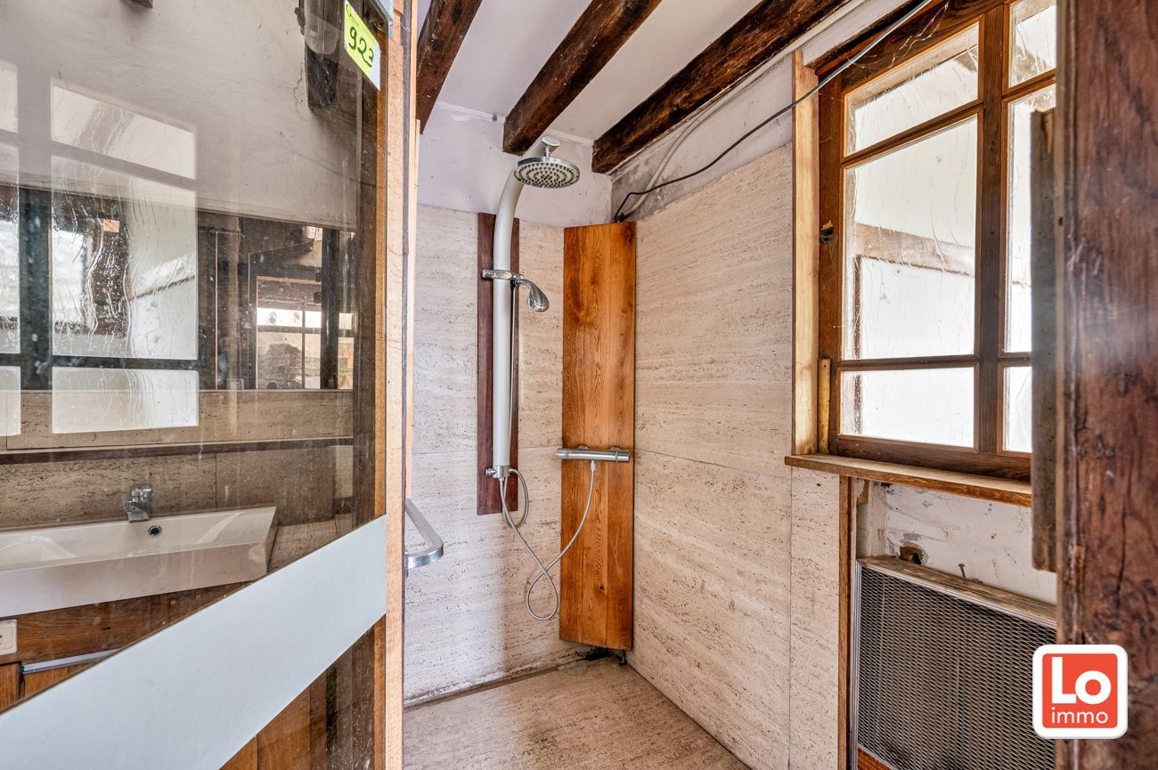 VERKOCHT!! Ruime alleenstaande volledig te renoveren woning met afzonderlijke garage op een makkelijk bereikbare locatie in Desteldonk. foto 24