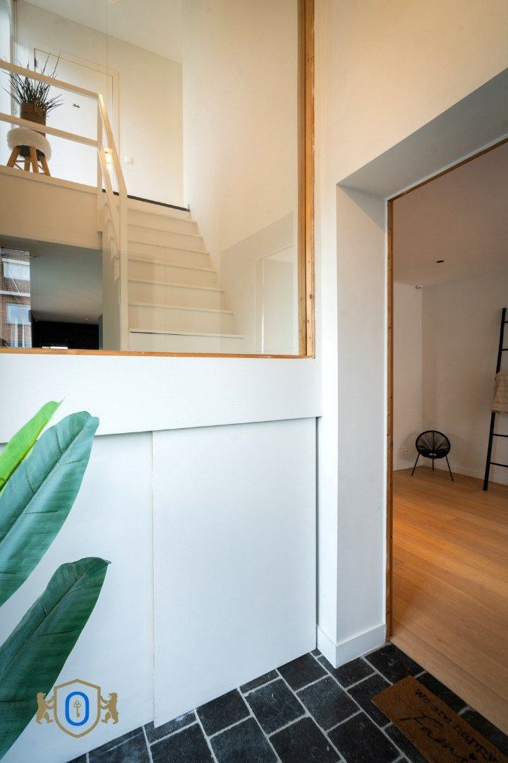 Halfopen 3-slpkr woning met tuin & carport foto 6