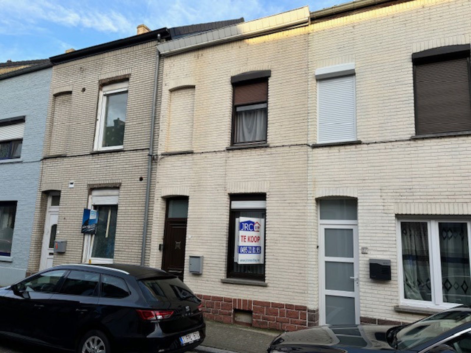 Woning met achteringang, garage en 4 slpks te Tienen foto 1