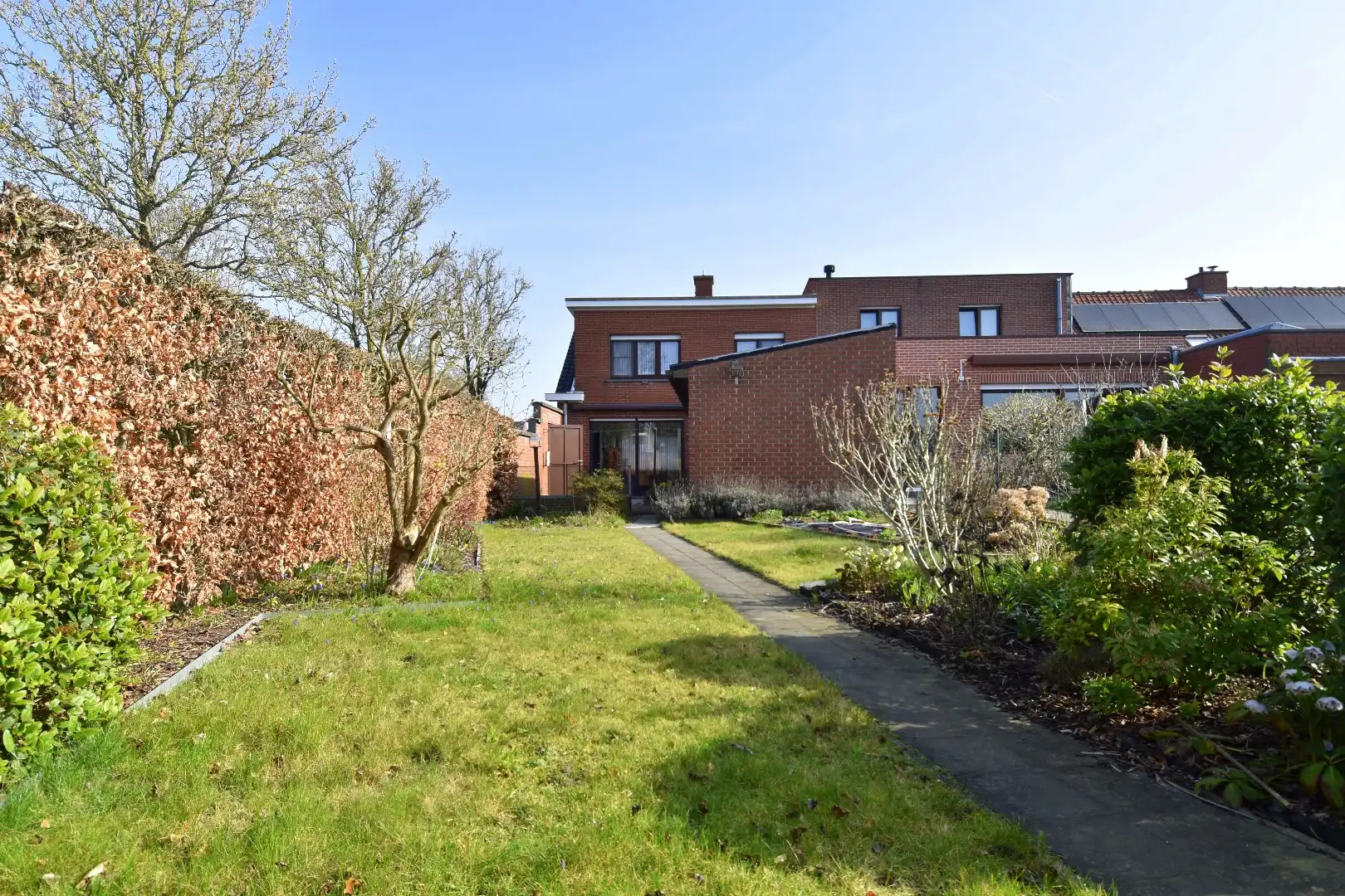 Woning op hoekperceel met 3 slaapkamers, garage en zalige tuin te koop in Gullegem foto 10