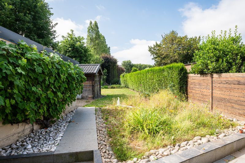 Goed onderhouden woning met zonnig terras en leuke tuin foto 6