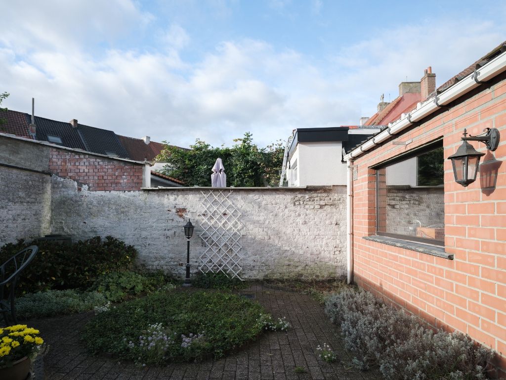 Woning met polyvalente mogelijkheden, zonnige tuin en inpandige garage op fietsafstand van het centrum van Gent. foto 6