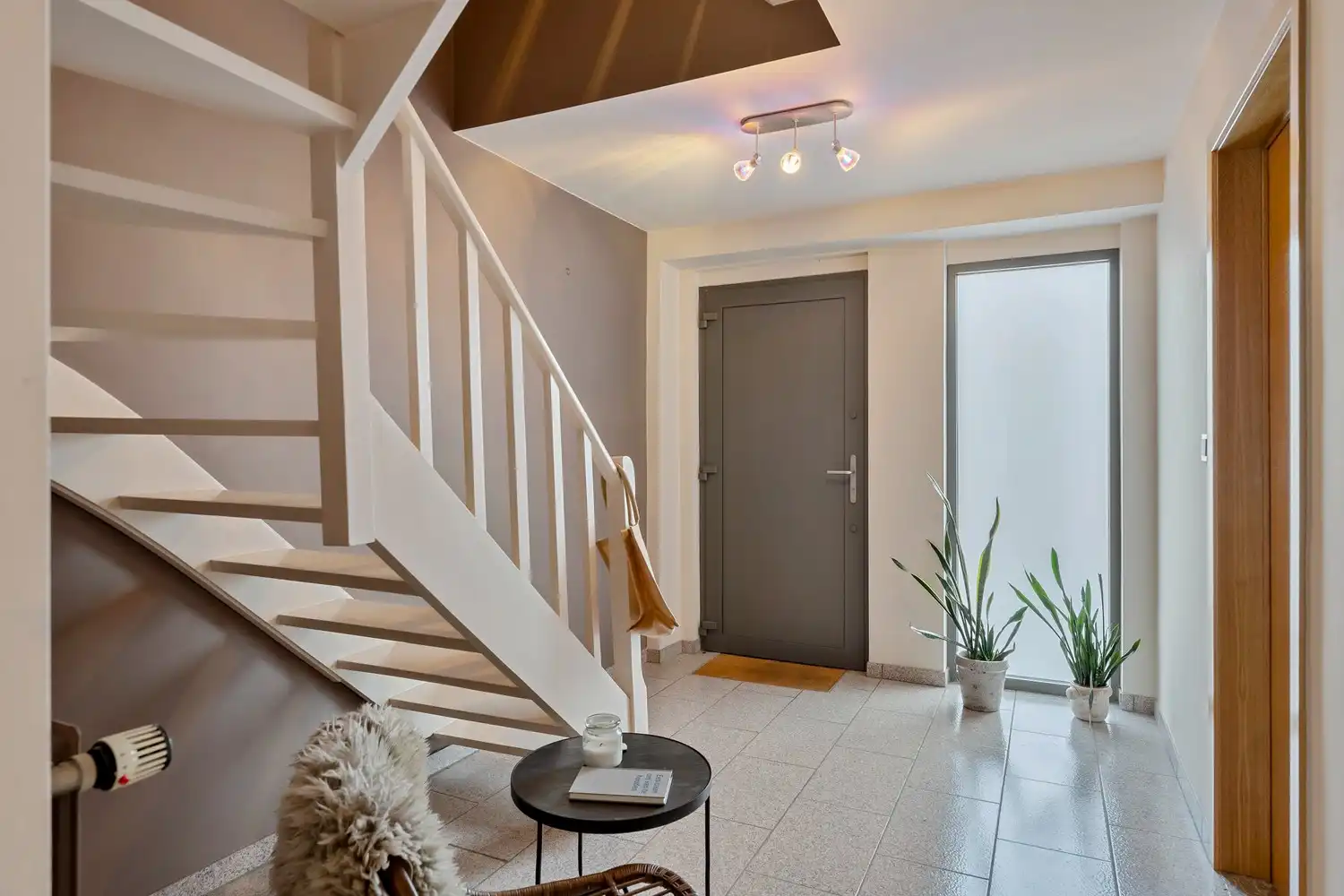 Goed gelegen woning met 4 slaapkamers, 2 badkamers, een garage met een autostaanplaats ervoor en een zuidwest georiënteerde tuin te Kessel-Lo! foto 6