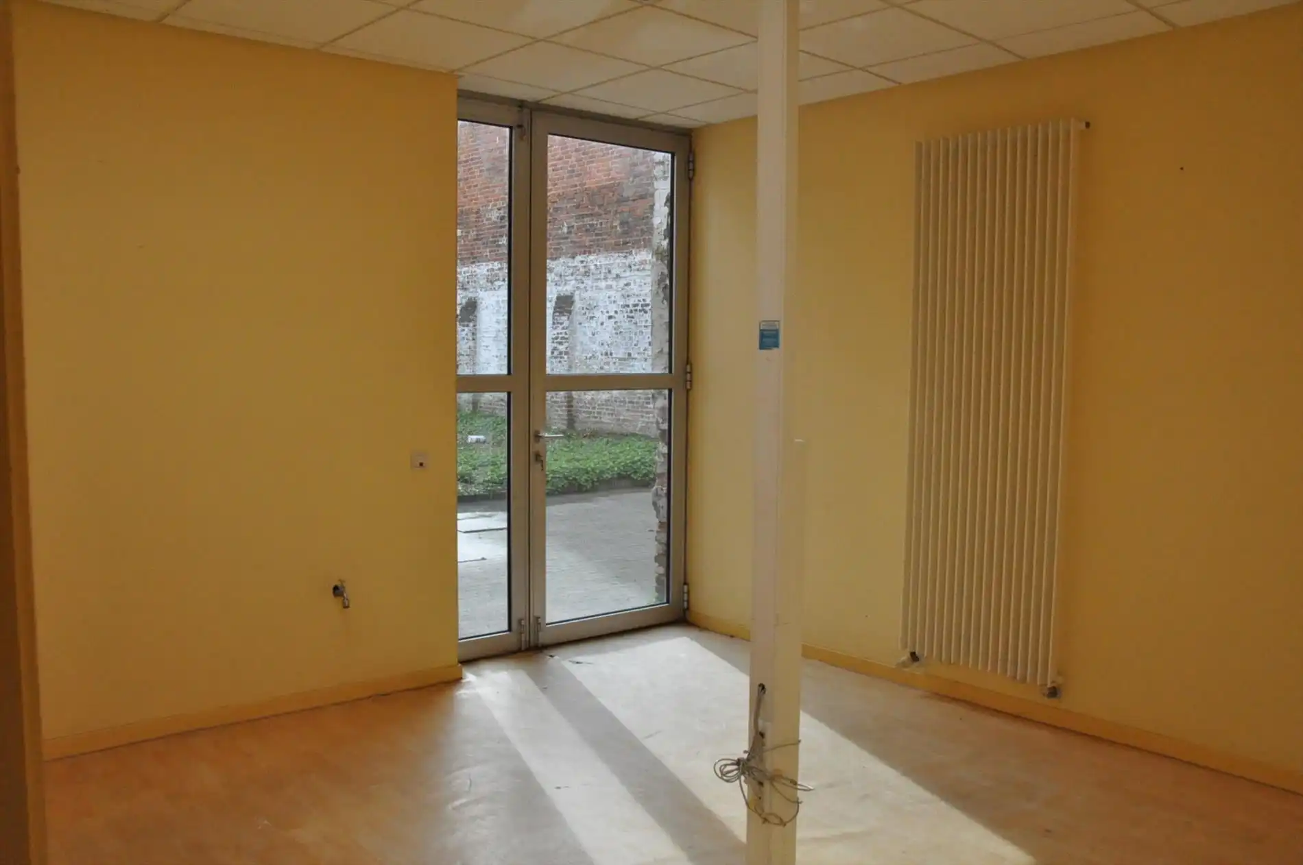 Handelspand (kantoor- of winkelruimte) met een totale oppervlakte van 150m² - centrale ligging foto 10