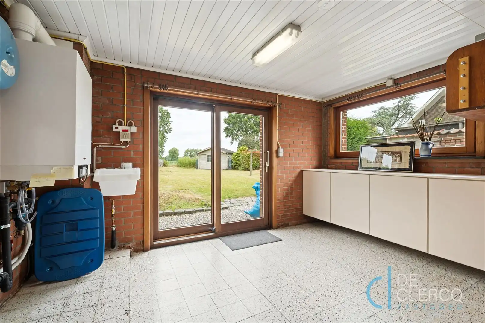 Woning met goed onderhouden tuin te koop in groot Lochristi! foto 11