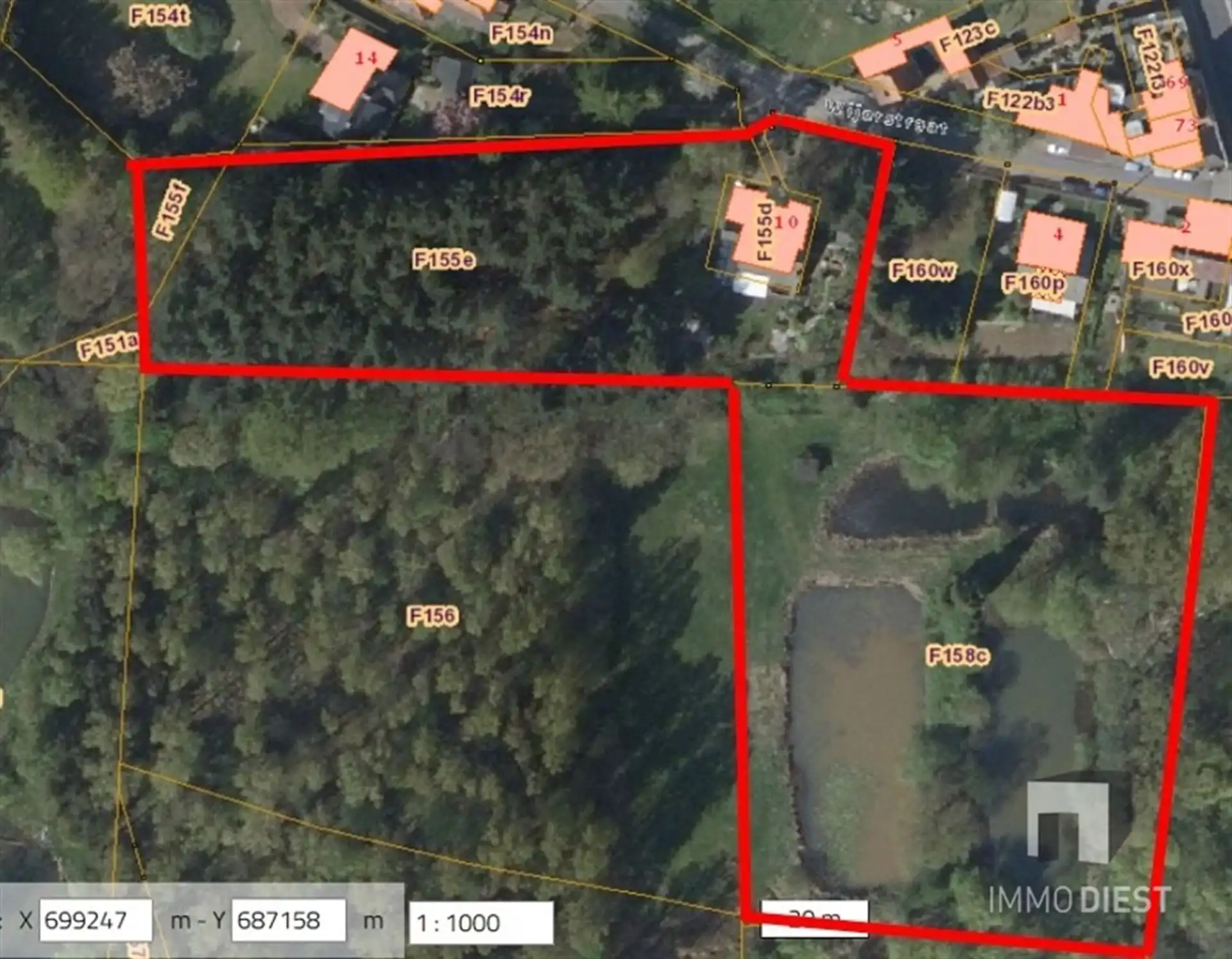 Prachtig gelegen villa met uniek ontwerp op 57a 74ca én achterliggende vijvers op 75a 54ca. foto 54