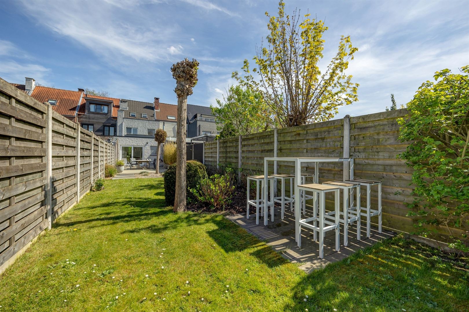 Goed onderhouden ruime stadswoning met grote tuin foto 3