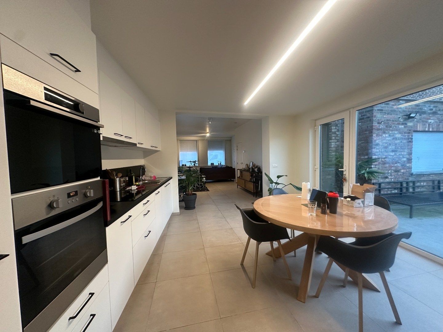 Ruime woning met zonnige tuin in centrum Merkem foto 4