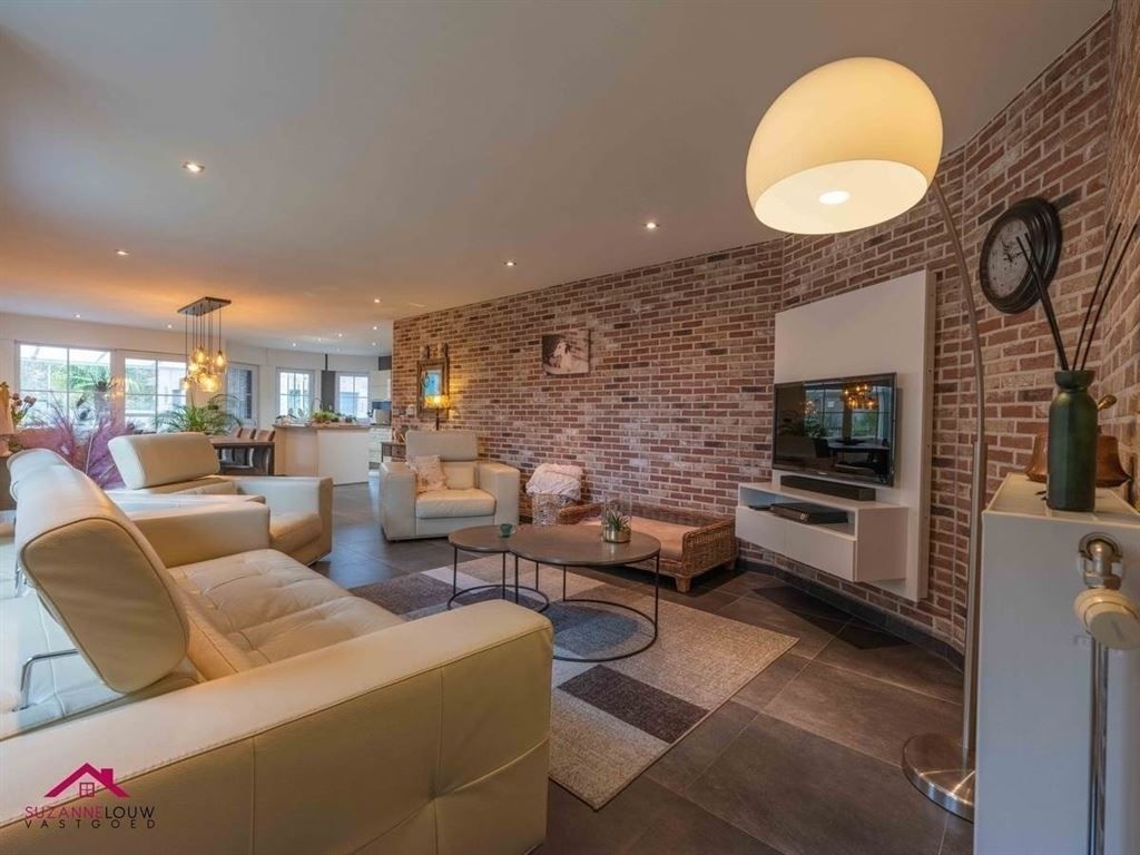 Stijlvolle vrijstaande woning met ruimte voor vrij beroep, garage en verwarmd zwembad op ruim perceel foto 13