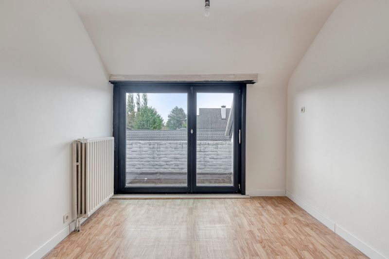 Ruime gezinswoning met tuin en zicht op groen foto 12