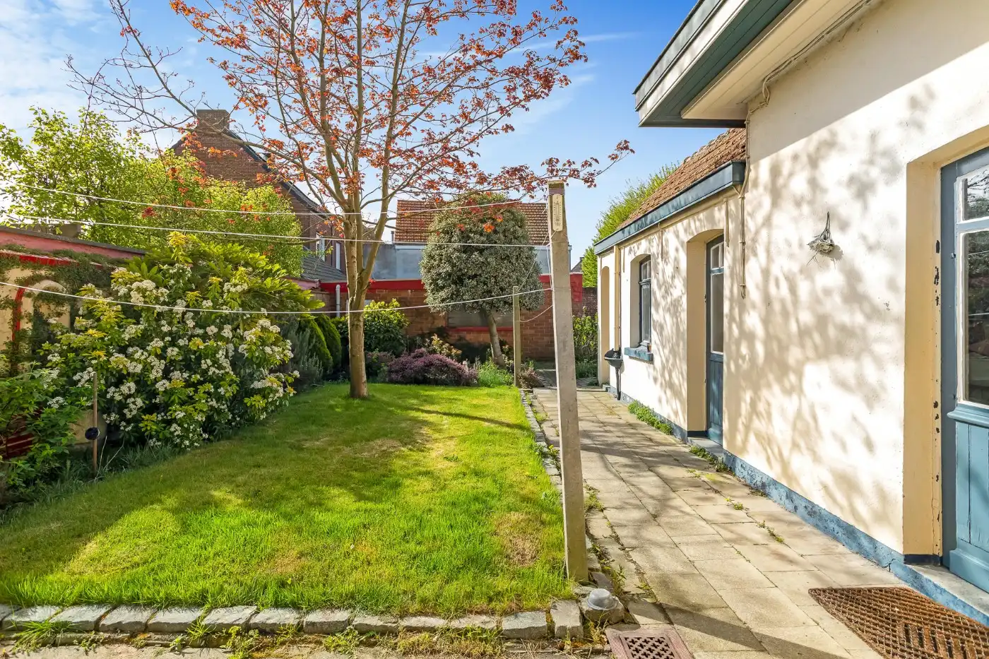 Te renoveren, geklasseerde art deco woning met 3 slpk, ruime zolder en Z-tuin foto 24