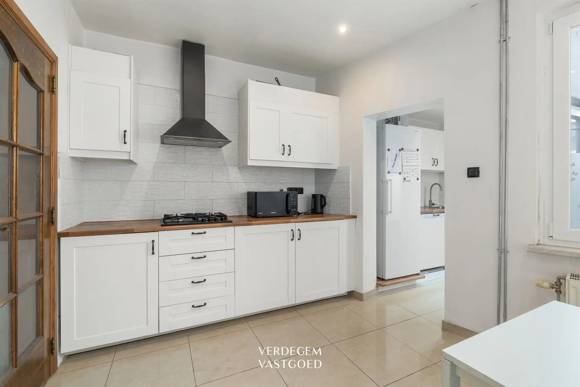 Instapklare woning met grote leefruimte en vier slaapkamers foto 2