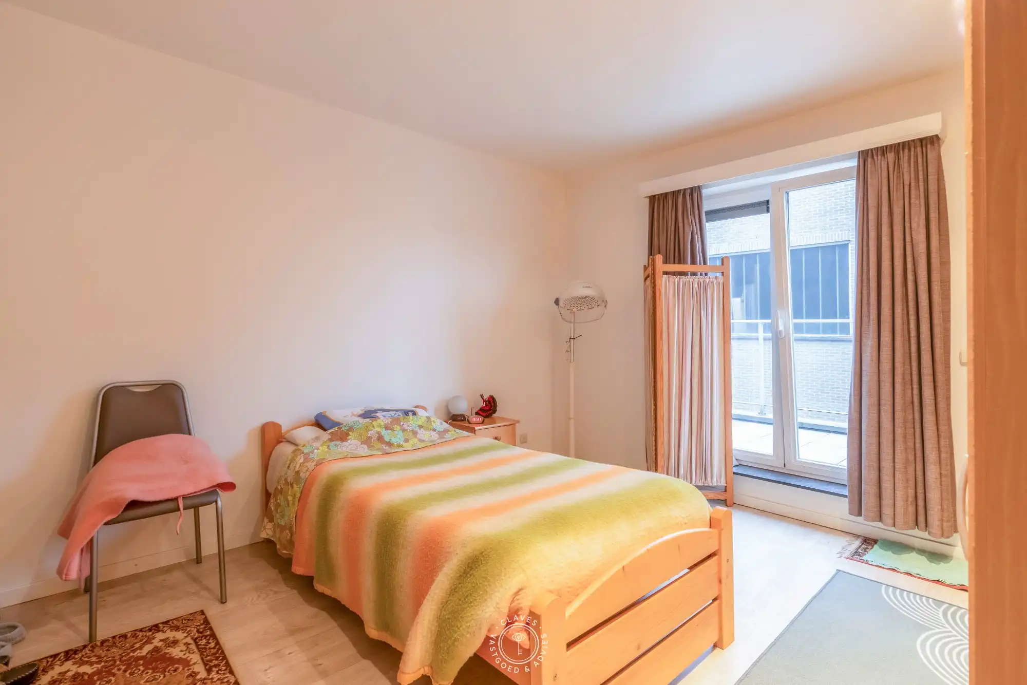 Centraal gelegen appartement met twee terrassen en autostaanplaats foto 12