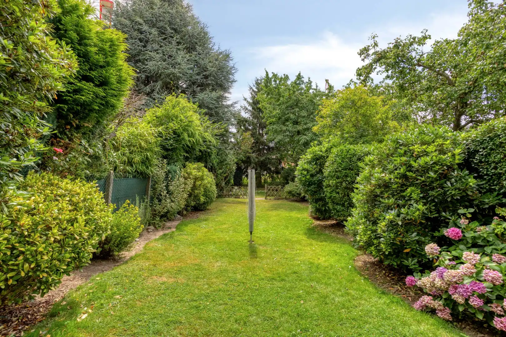 Opbrengsteigendom met tuin en 2 verhuurde appartementen in Wemmel foto 22