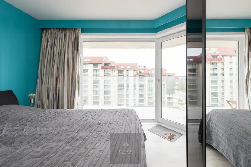 Ruim doorloop-appartement met 2 slaapkamers in de vernieuwde residentie Scorpio op de zeedijk te Nieuwpoort-Bad. foto 27
