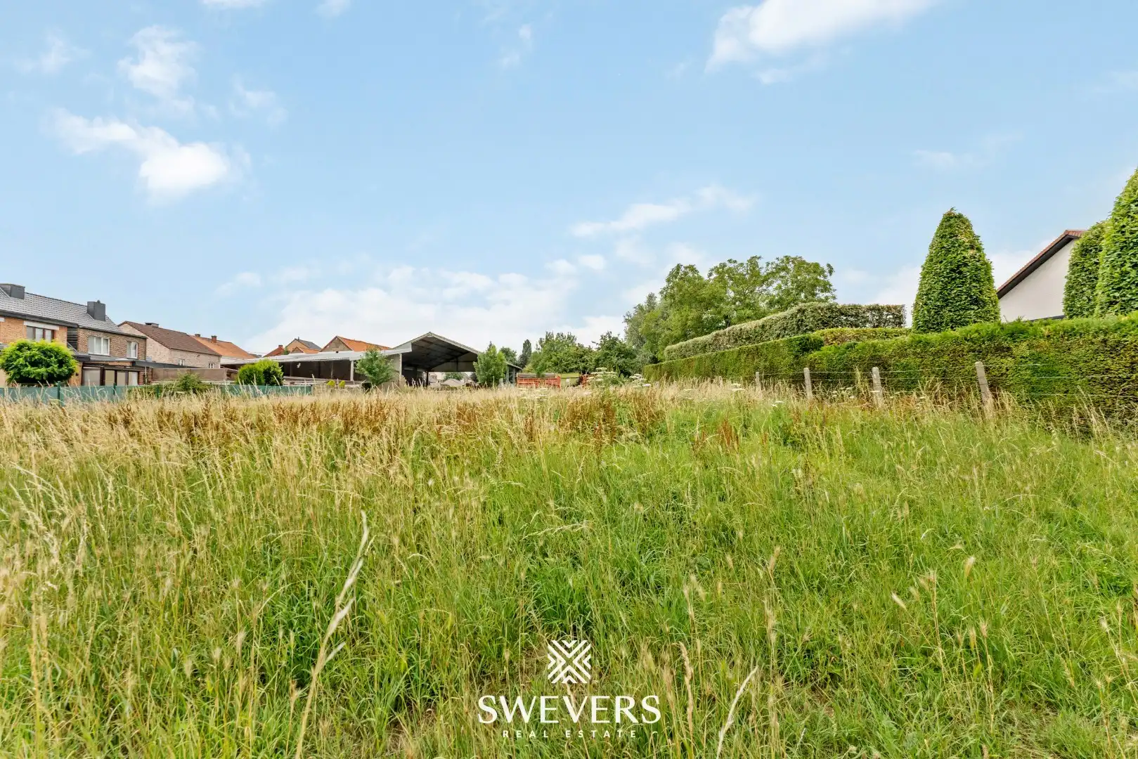 Bouwgrond voor halfopen bebouwing in hartje Riemst foto 10