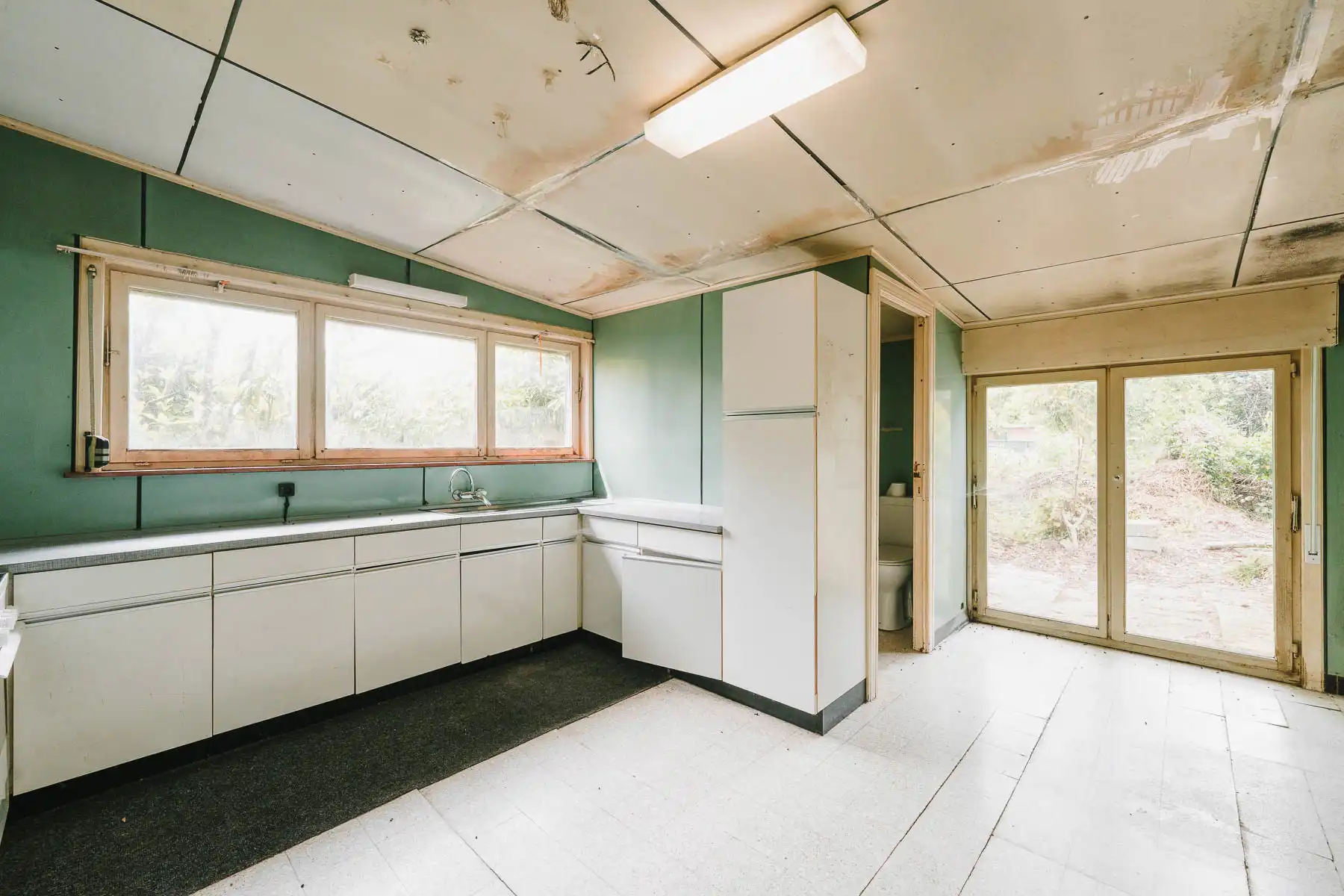 Gezellige, te renoveren open woning in een rustige straat foto 12