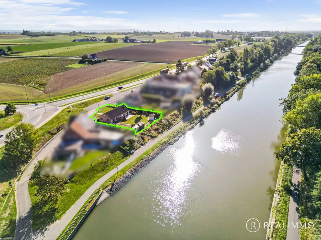 Gelijkvloers wonen op een unieke ligging langs het kanaal Bossuit-Kortrijk! foto 2