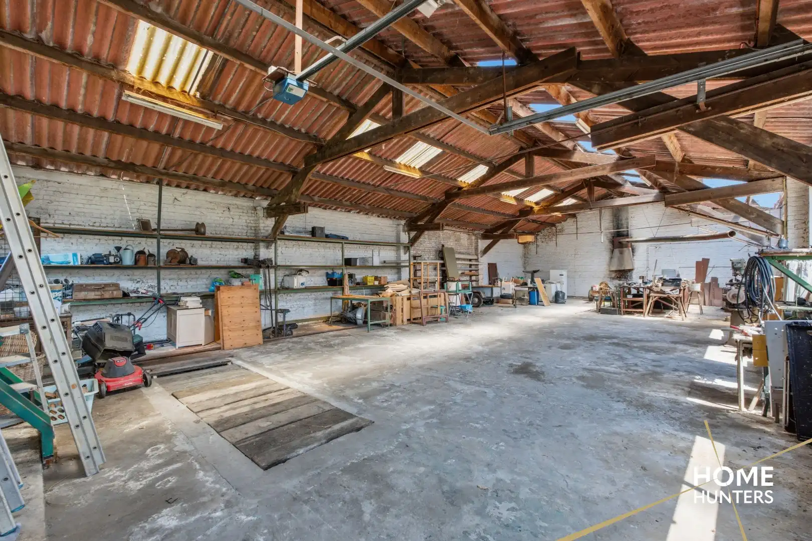 Ruime halfopen bebouwing met loods van 200 m² op een perceel van 919 m² foto 21