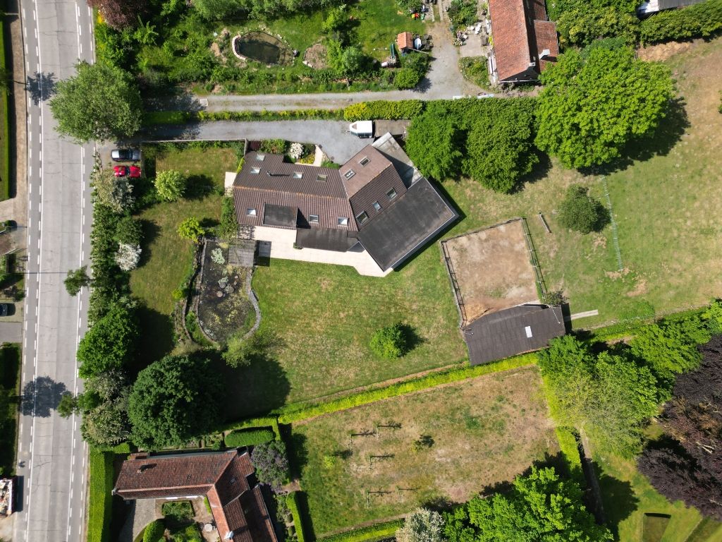 Vrijstaande woning met prachtige tuin en uitzonderlijk bouwvolume (424 m²), omringd door groen foto 19