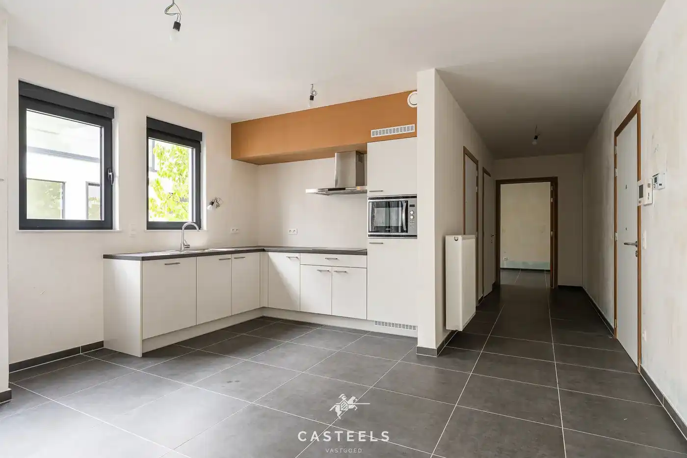 Lichtrijk appartement met grote gemeenschappelijke tuin foto 4