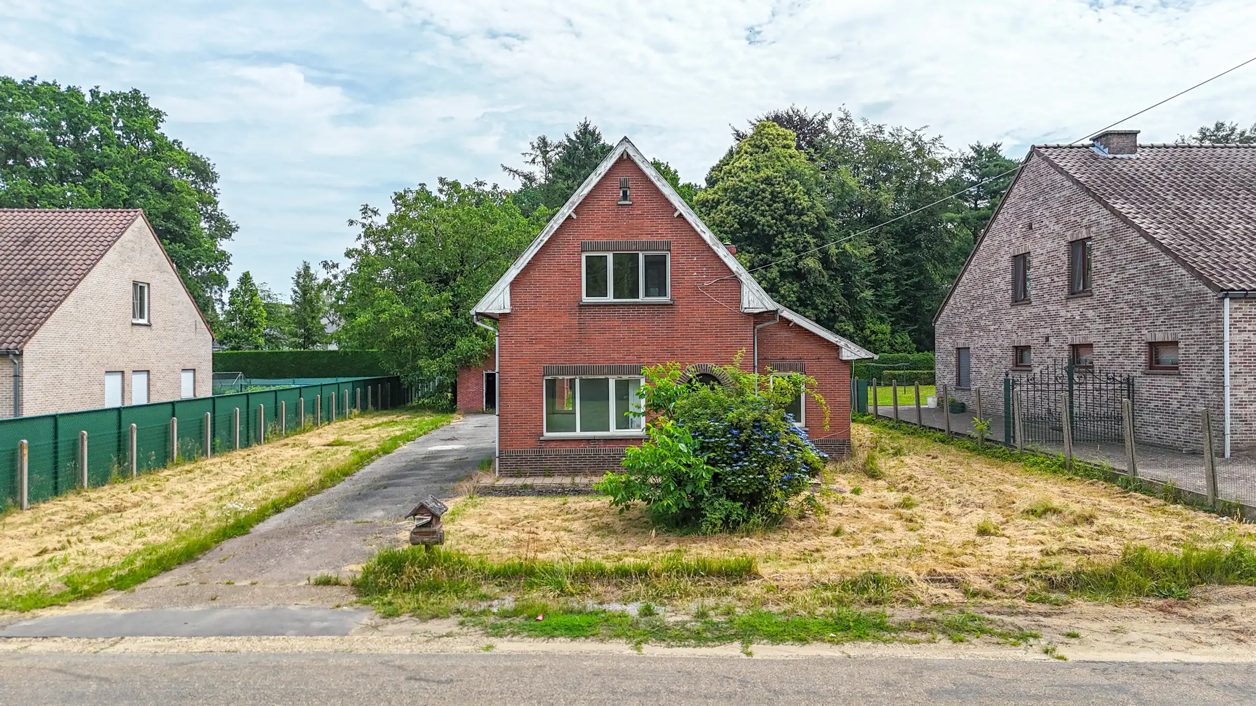Te renoveren woning op groot perceel te Heusden-Zolder! foto 21