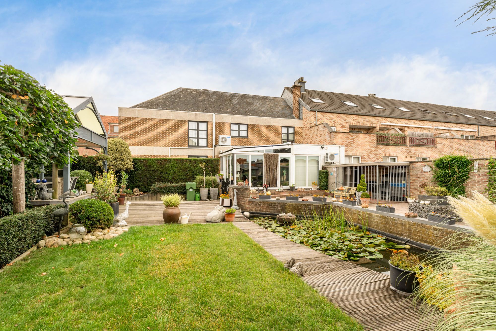 Ruime gezinswoning met knappe tuin en bouwgrondmogelijkheid in Vlijtingen! foto 27