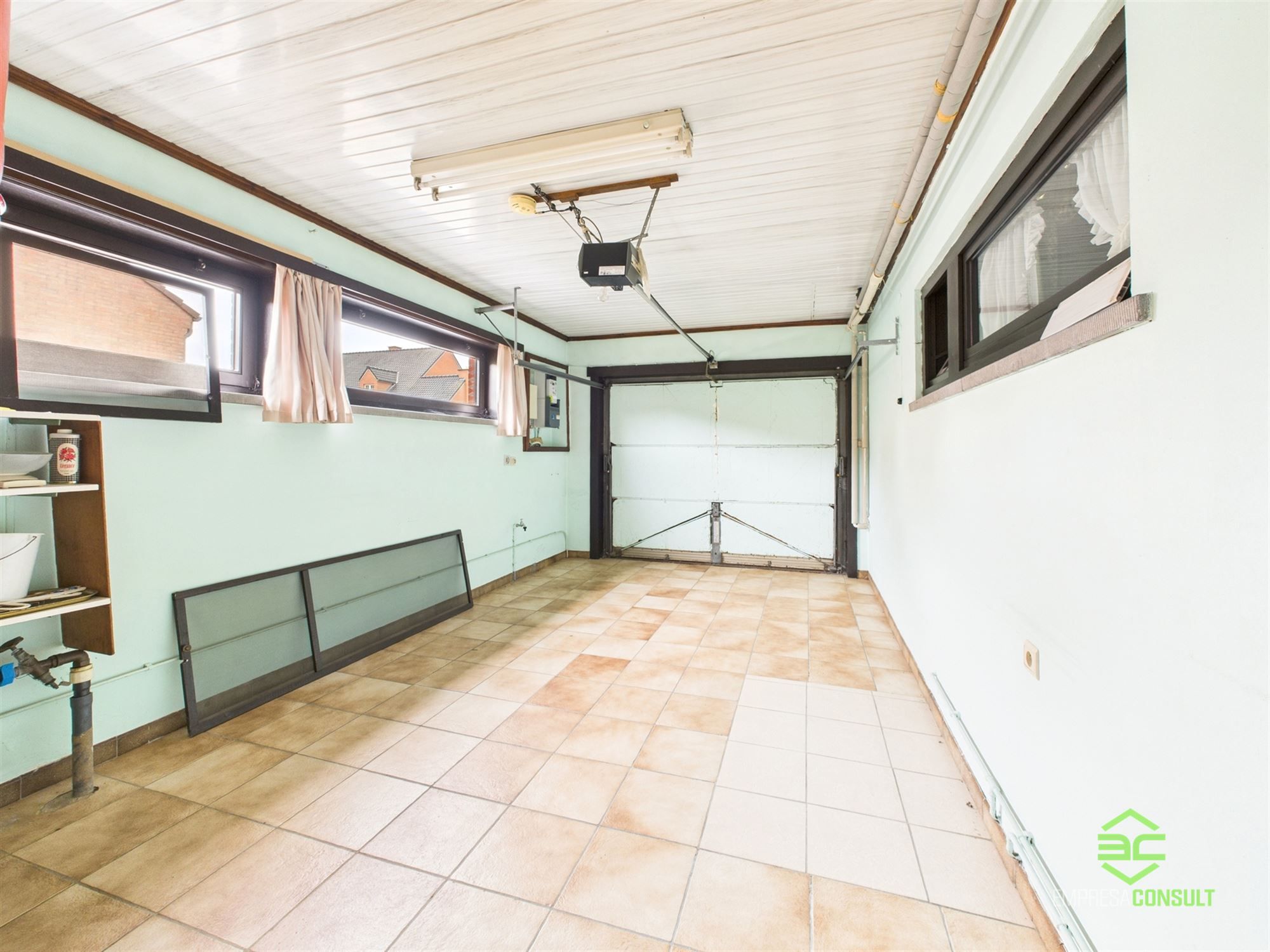 Gelijkvloerse woning in het centrum met 2 slpk en ruime tuinberging! foto 12