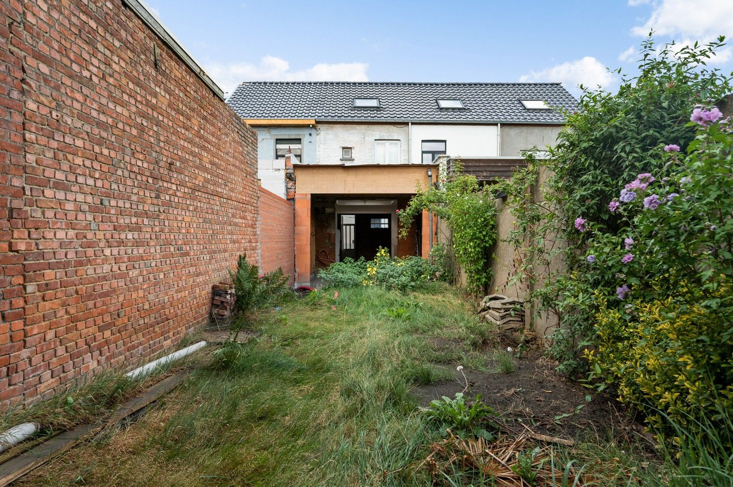 Leuke, verder af te werken woning met 3 slaapkamers en tuin op toplocatie in Lier! foto 9
